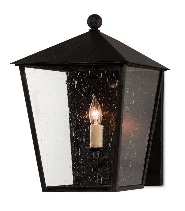 The Bening outdoor wall sconce combines durability with classic design. Its Trilux finish offers superior weather resistance with a 5-year guarantee, while seeded glass panels add vintage charm to exterior spaces.