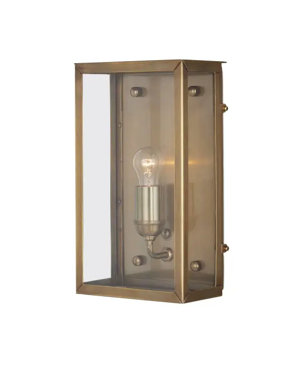 The Royster wall sconce combines timeless American industrial styling with modern outdoor performance. Its antique brass finish and clear glass shade deliver warm, welcoming light while resisting fade, rust, and cracks.