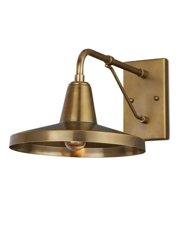 A nostalgic outdoor wall sconce that blends modern farmhouse warmth with industrial simplicity. The antique brass finish with textural patina and geometric form creates an Americana aesthetic perfect for welcoming entryways.