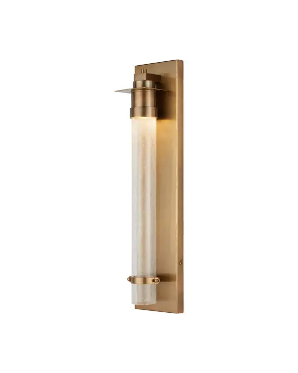 The Provence LED Wall Sconce combines contemporary design with traditional brass craftsmanship. Its seeded glass tube creates visual interest when lit and adds texture when off. Wet-location rated for durability.