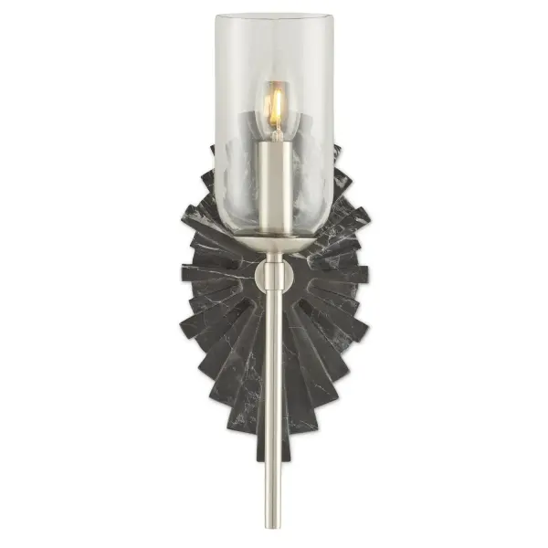 The Benthos wall sconce combines natural Marquino marble with a nickel finish and clear glass shade. Its distinctive starburst pattern and natural stone veining create a sophisticated focal point. Damp-rated for bathroom use.