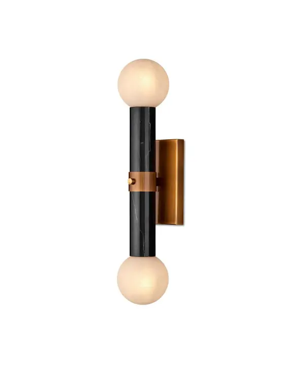 A sophisticated two-light wall sconce featuring a striking black marble center column with milky textured glass globes. The antique brass finish adds warmth while the natural stone veining ensures each piece is unique.