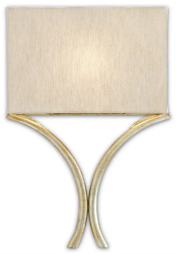 The Cornwall sconce combines wrought iron wishbone stems with a natural linen shade for a sophisticated, organic look. Its ADA-compliant design and silver leaf finish make it versatile for residential and commercial spaces.