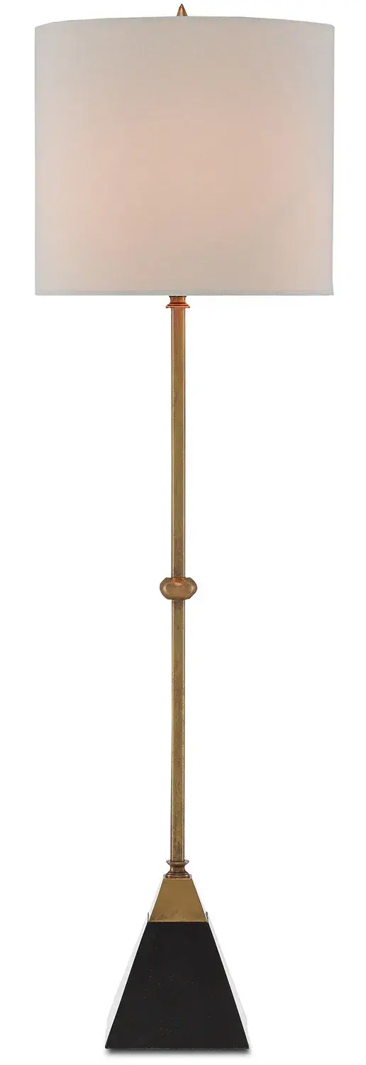 The Recluse Table Lamp combines vintage brass metalwork with a striking black granite pyramid base, creating a sophisticated accent piece that bridges traditional and contemporary design sensibilities.
