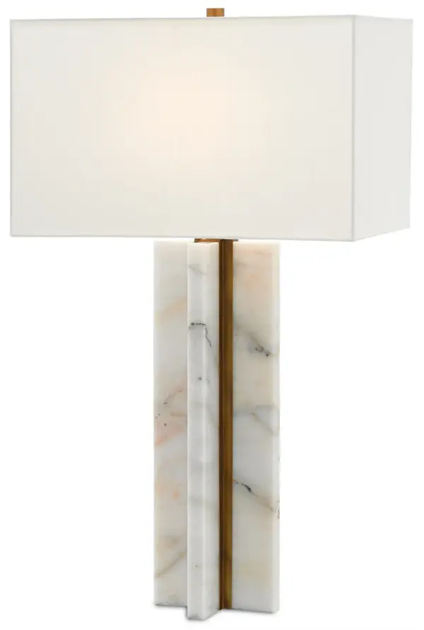 The Khalil Table Lamp combines natural marble slabs with antique brass metal in a striking geometric design. Its substantial presence and warm salmon-toned marble make it a sophisticated statement piece for contemporary interiors.