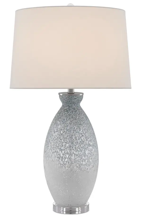 The Hatira brings artistic sophistication with its hand-applied pale blue and white patterning on clear glass, creating a fog-like effect. The optical crystal base adds luxury while the oversized linen shade provides soft, ambient lighting.
