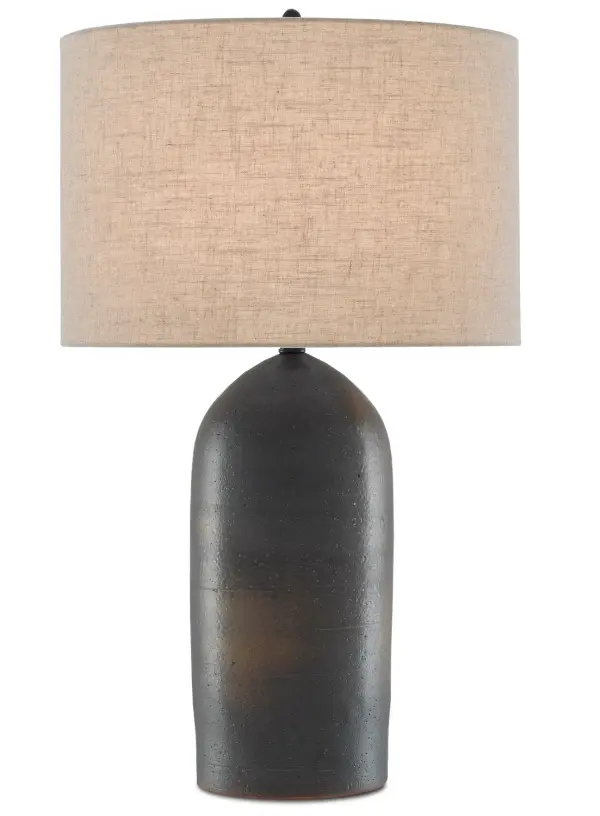 The Munby brings artisanal character with its hand-finished ceramic body featuring rust and iron-hued patina. The torpedo shape and natural linen shade create a sophisticated rustic aesthetic that works in both traditional and modern interiors.
