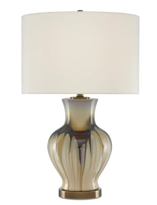 The Muscadine Table Lamp combines handcrafted cream and brown porcelain with antique brass hardware for a sophisticated, organic aesthetic. Its generous 27-inch height and classic drum shade make it ideal for living spaces and bedrooms.