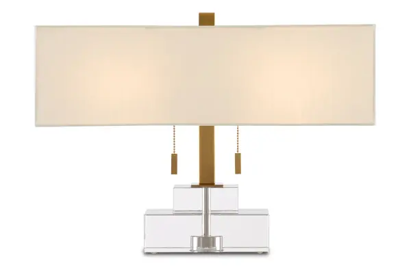 The Chiara table lamp combines stacked optic crystal rectangles with antique brass hardware for a sophisticated look. Its compact 20-inch length makes it ideal for bedside tables and desks without overwhelming the space.
