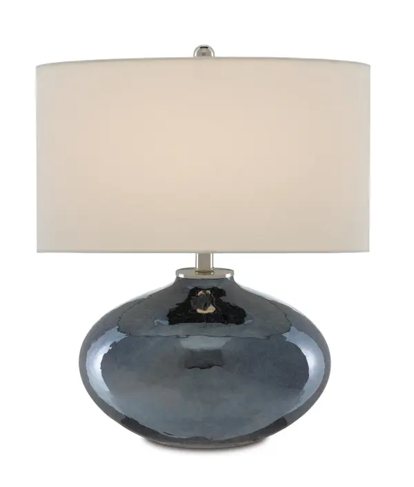 A stunning table lamp featuring hand-blown blue plated glass with a mercury-like finish that creates a radiant glow. The polished nickel hardware and off-white shantung shade provide elegant contrast to the luminous blue base.