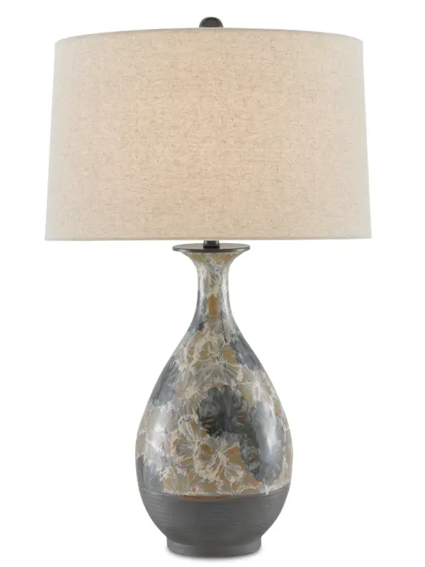The Frangipani brings sophisticated traditional style with its hand-painted floral porcelain base in soft cream, tan, and blue tones. The natural linen shade complements the delicate color palette while the 3-way switch offers lighting flexibility.