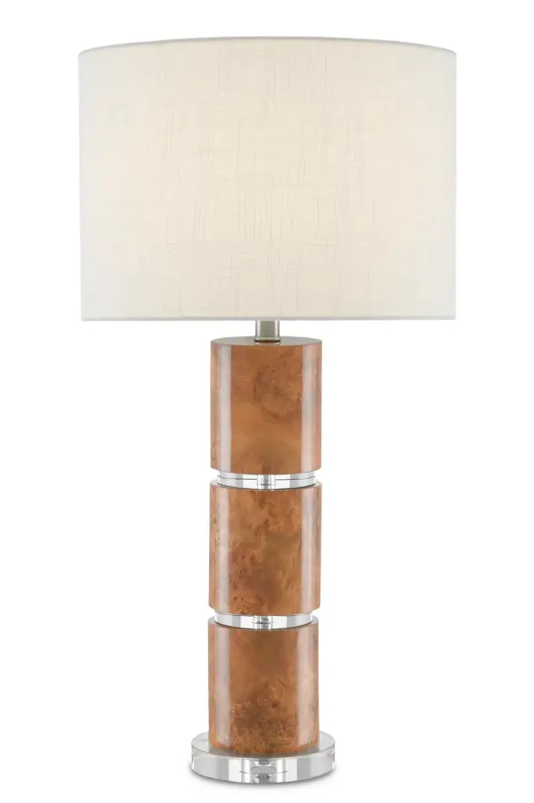 The Birdseye Table Lamp combines marbled paper cylinders mimicking birdseye maple with optic crystal discs and base, creating a refined transitional aesthetic. The white shantung shade softens the light while the crystal elements add sparkle.