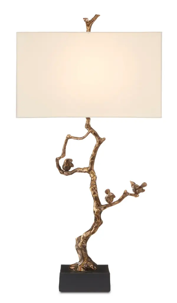 The Shadows Table Lamp brings organic sophistication to any space with its twig-inspired aluminum base in antique brass. The sculptural design creates visual interest while the clean rectangular shade keeps it versatile enough for traditional or contemporary interiors.