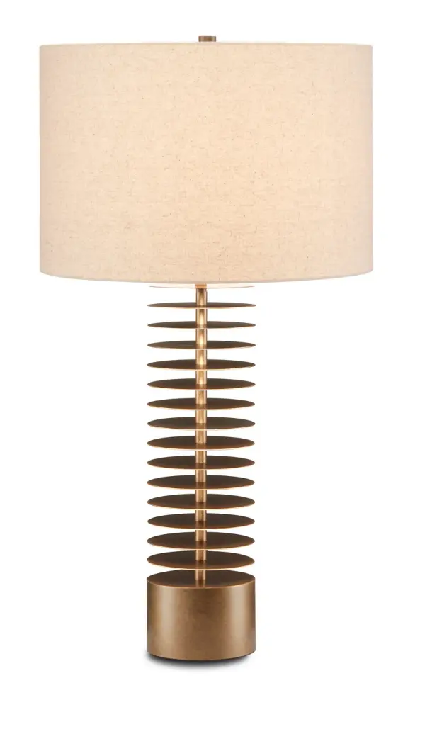 The Walwyn Table Lamp brings architectural drama to modern interiors with its unique stacked disk construction. The 16 evenly spaced metal disks create visual interest while the antique brass finish adds warmth. Perfect for design-forward spaces.