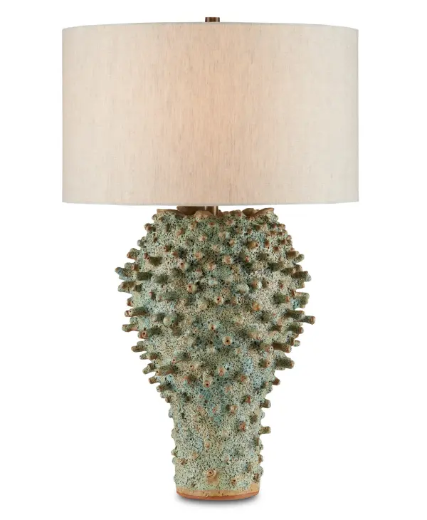 This striking table lamp showcases exceptional artisan craftsmanship with hand-applied extrusions that create a unique sea urchin-inspired texture. The moss green reactive glaze over black terracotta delivers an authentic underwater aesthetic with natural mottling that ensures each piece is one-of-a-kind.