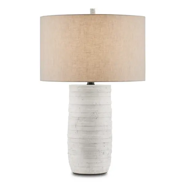 The Innkeeper White Table Lamp features stacked terracotta discs that create striking visual texture and architectural interest. The contrast between the white finish and satin black hardware adds modern sophistication to its organic form.
