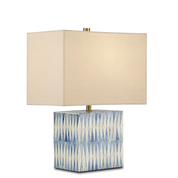 A sophisticated decorative table lamp featuring hand-applied blue and ivory bone in a striking jagged pattern. The generous rectangular linen shade and compact footprint make it ideal for adding coastal elegance to bedrooms and living spaces.