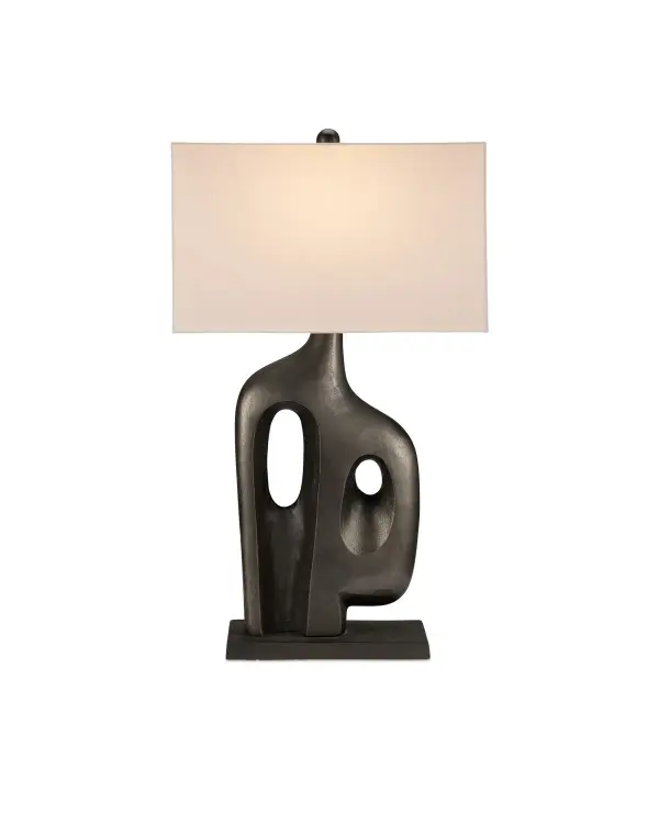A striking table lamp that bridges mid-century modern and brutalist design with its flowing aluminum form. The graphite finish adds substantial visual weight while the bone linen shade provides soft contrast. Perfect for making a design statement.