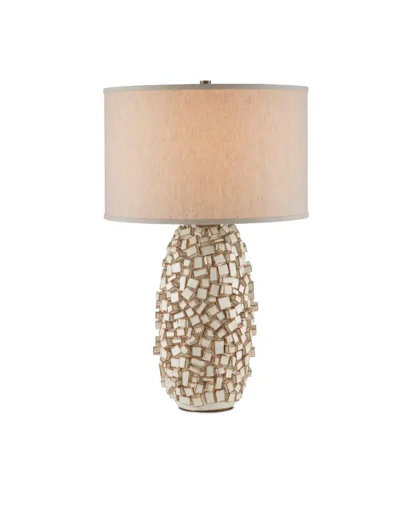 The Sugar Cube Table Lamp showcases exceptional ceramic craftsmanship with its distinctive cube-textured surface in ivory and brown glazes. At 29 inches tall, it provides substantial presence while the natural linen shade softens the light beautifully.