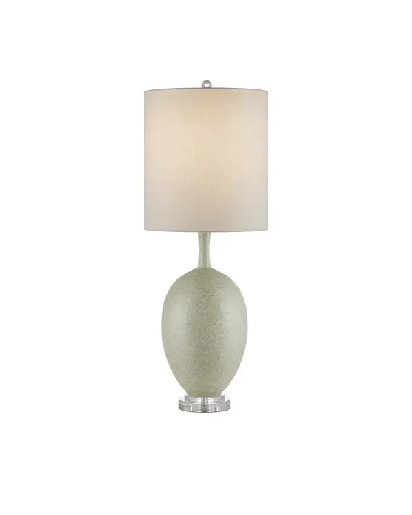 An elegant table lamp featuring a distinctive green and white swirling pattern on porcelain that creates visual interest from both near and far. The optic crystal base and finial add refined touches to this statement piece.