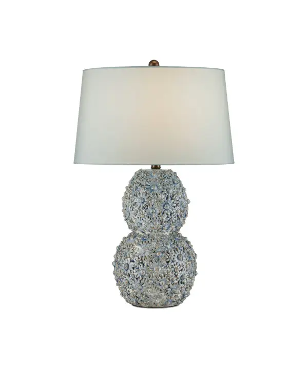 A stunning table lamp featuring hand-applied ceramic flowers in a serene cloud blue finish. Each bloom is individually crafted by skilled artisans, creating a unique piece that brings coastal charm and artisanal character to any space.