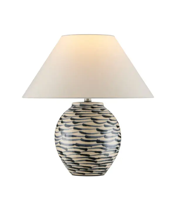 A charming table lamp featuring hand-painted navy blue fish-like brush strokes on a beige crackle-finish ceramic base. The Asian-inspired design pairs beautifully with the flared empire shade, creating an artisanal accent piece with coastal character.