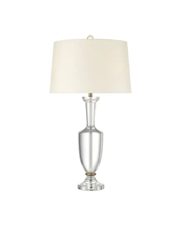 The Classico Table Lamp showcases exceptional craftsmanship with its optic crystal body inspired by Zanfirico glassblowing tradition. The baluster-shaped design and natural brass accents create a sophisticated statement piece.