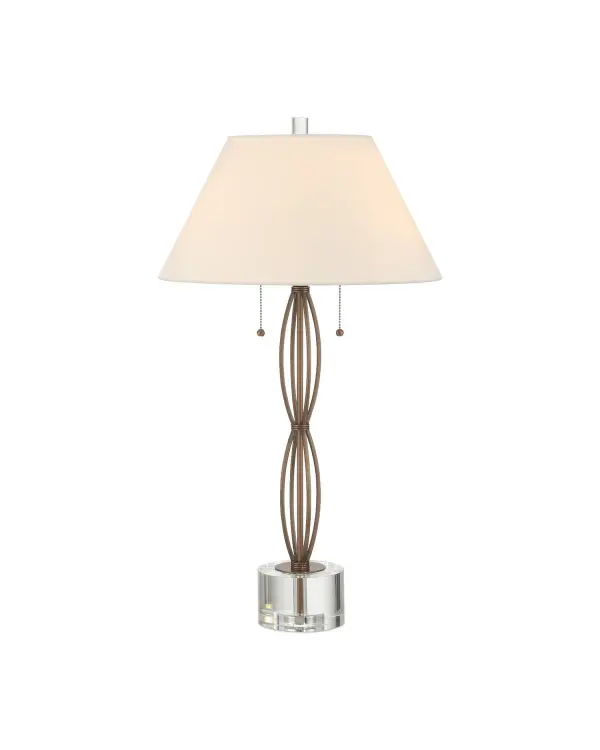 The Mizner Table Lamp combines slender brass rods in a fluted, architectural profile with optic crystal accents for sophisticated style. Its warm antique brass finish and graceful silhouette work beautifully in transitional spaces.