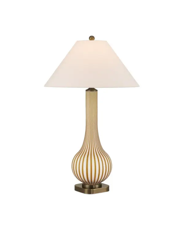 A sophisticated table lamp featuring meticulous two-step glassmaking where ochre glass rods fuse onto white glass to create distinctive striations. The antique brass base and flared empire shade balance artisan craftsmanship with versatile style.