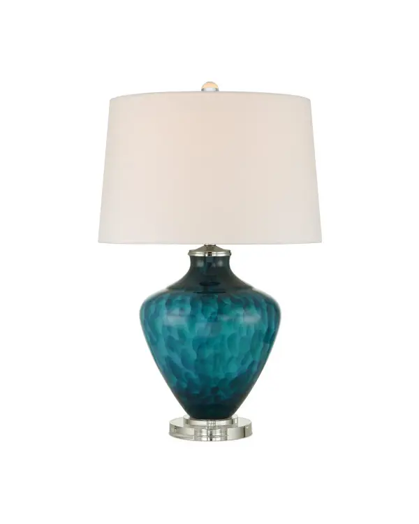 A striking statement piece featuring hand-crafted fused glass with floating blue patterns that create visual depth and movement. The optic crystal base and polished nickel hardware add contemporary sophistication to this artisanal design.