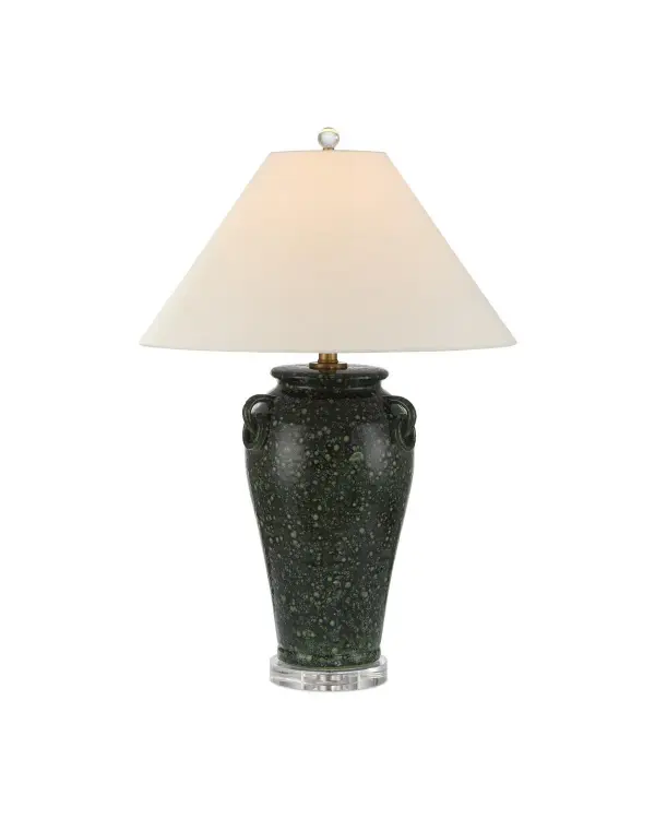 The Junko combines artisanal craftsmanship with sophisticated materials. Its mottled green terracotta body, created through a specialized firing process, pairs beautifully with antique brass hardware and an optic crystal base for a refined, layered look.