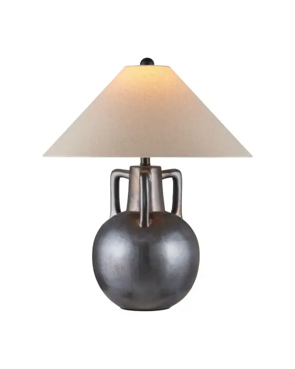 The Autry Table Lamp showcases handcrafted ceramic artistry with a reactive glaze that creates a distinctive marbled, metallic appearance unique to each piece. Its three-handled jug silhouette and tonal bronze hardware deliver sophisticated style.