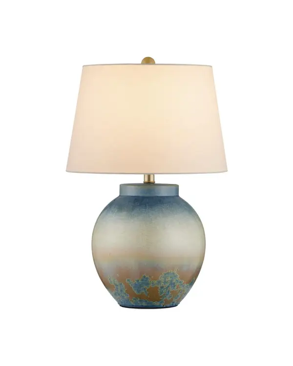 A distinctive table lamp featuring handcrafted ceramic with a crystallization glaze process that creates one-of-a-kind patterns. The yellow and blue tones evoke sunrise over ocean, offering organic texture and visual interest. Ideal for coastal, organic modern, or artisanal interiors.