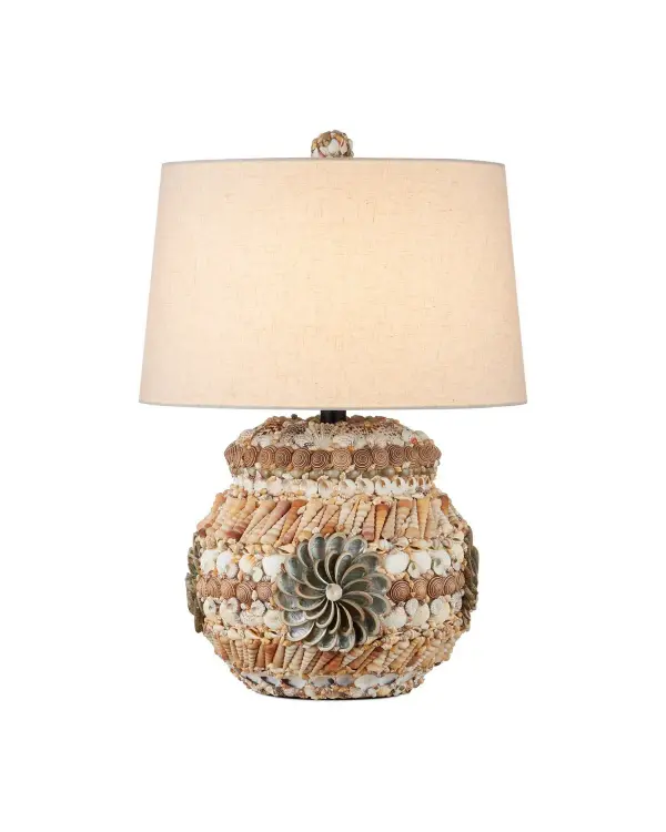 This distinctive table lamp showcases exceptional craftsmanship with its terracotta body adorned in an intricate swirl of seashells arranged in tonal striated patterns. The natural aesthetic brings organic coastal elegance to any space.