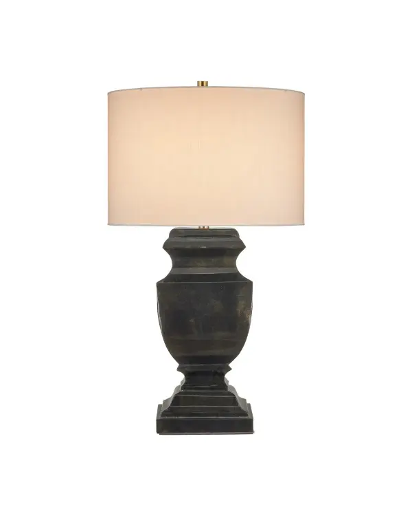 The Balustrade Table Lamp combines traditional elegance with industrial edge through its mottled distressed black and gold iron finish. At 31.5 inches tall, it provides substantial presence while the off-white shade softens the look.