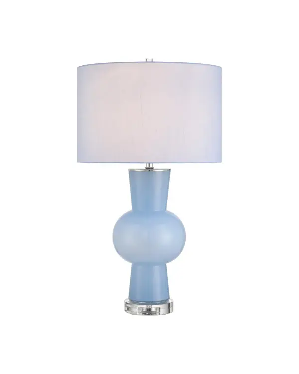 The Duende table lamp showcases artisanal craftsmanship with pale blue glass formed into striking geometric shapes. Its interplay of globes and cylinders creates visual interest while the optic crystal accents add refined elegance.