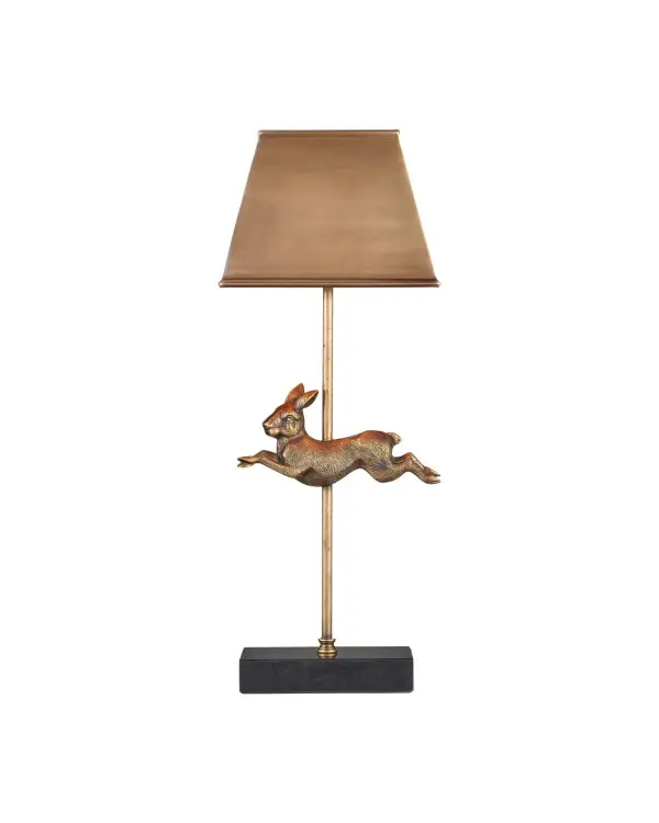A charming conversation piece featuring a bounding hare sculpture in unlacquered brass with beeswax finish. The compact size and marble base make it perfect for adding character to bedside tables or desks without overwhelming the space.