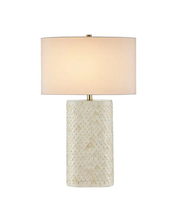 A stunning statement piece featuring hand-cut buffalo bone rounds arranged in a mermaid-scale pattern. The labor-intensive craftsmanship and organic texture make this lamp a conversation starter with refined coastal elegance.