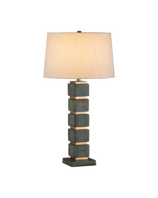 The Tetra Table Lamp reimagines the classic stacked silhouette with contemporary geometric blocks in verdigris finish, accented by antique brass spacers. At 33 inches tall, it makes a bold statement while the on-trend green patina adds character.