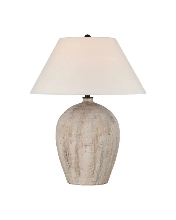 The Fresco Table Lamp showcases authentic terracotta craftsmanship with hand-poured beige and brown glazes that create a weathered, vintage aesthetic. Each piece is unique due to varied glaze placement, making it ideal for spaces seeking character and warmth.