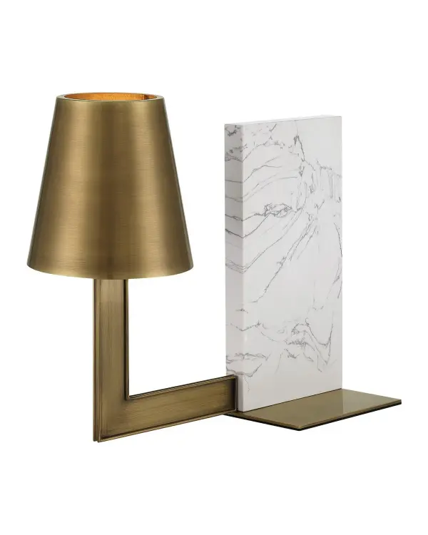 A sophisticated cordless table lamp combining geometric brass elements with natural white marble. Its slim profile and rechargeable LED make it perfect for flexible placement anywhere power outlets are limited.