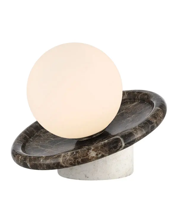 A striking portable lamp featuring stacked geometric forms in brown and white marble topped with an opaque globe. The rechargeable LED design offers cord-free flexibility with touch control and warm 2700K lighting.