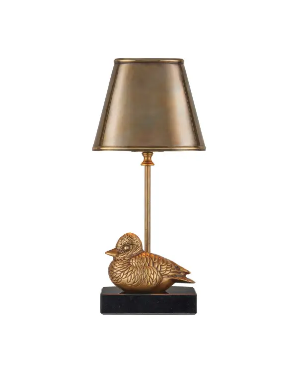 A charming decorative table lamp featuring a handcrafted brass Mandrake duck on black granite base. The cordless rechargeable design offers portability and flexibility, while the vintage brass finish adds warmth and character to any space.