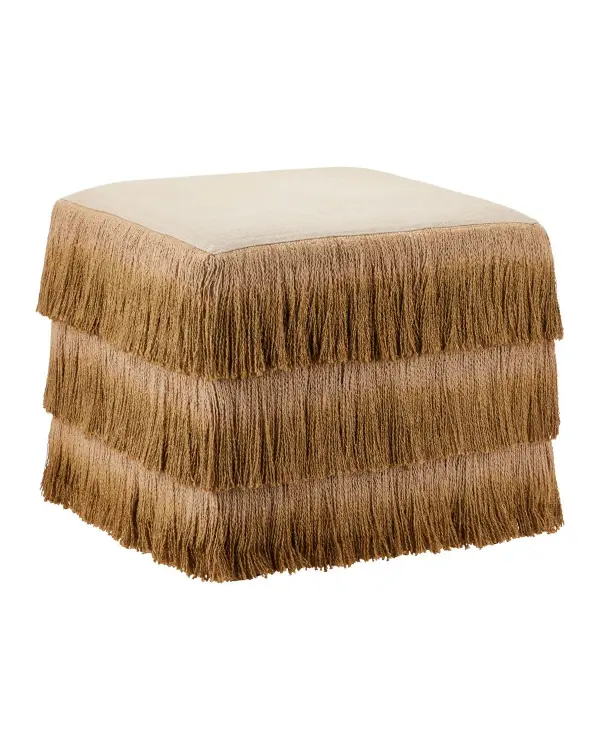 This distinctive ottoman features cascading ombré-dyed jute fringe over a sturdy wood frame, offering both visual interest and practical seating. The hand-dyed aesthetic evokes vintage mid-century textiles while maintaining structural integrity superior to typical poufs.