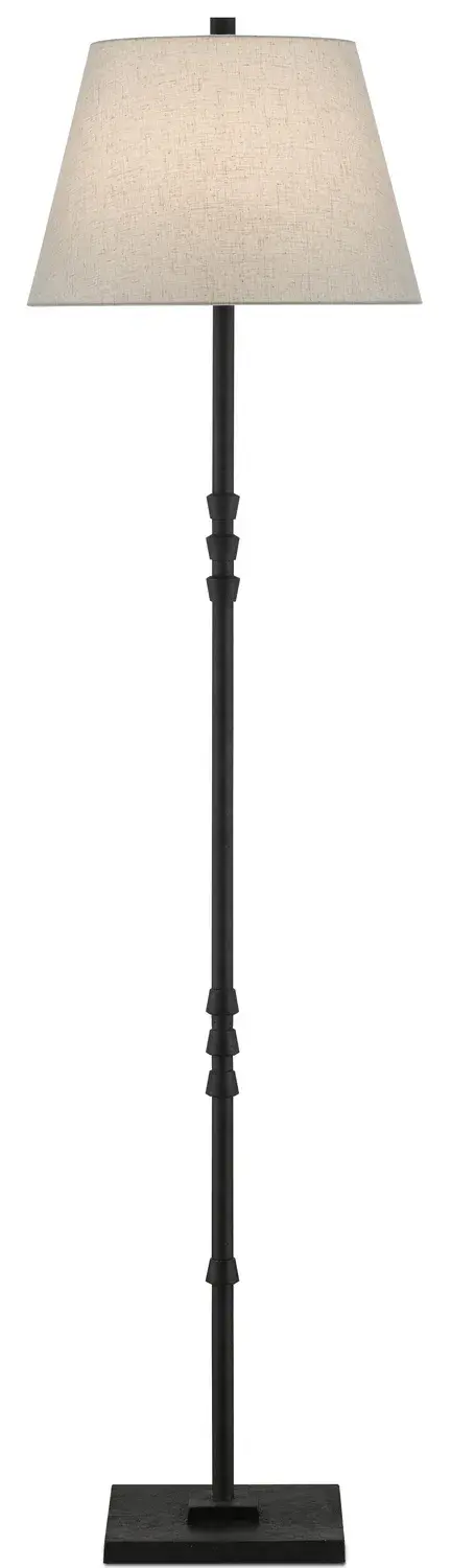 The Lohn Floor Lamp combines traditional elegance with functional design. Its cast-iron construction features subtle fluted ornamentations and a stacked base, finished in sophisticated Molé Black with a warm beige poplin shade.