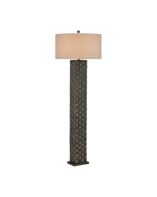 The Eden Floor Lamp showcases exceptional craftsmanship with hand-twisted, painted seagrass woven into an intricate gingham pattern. The 68-inch tall design pairs richly textured natural fibers with a soft linen drum shade, creating sophisticated ambient lighting with organic warmth.