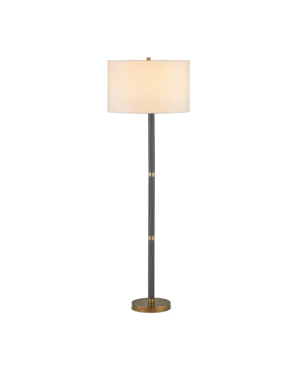 The Gavin floor lamp combines brass antique and matte black finishes for sophisticated contrast. Its slim cast aluminum body and off-white shade provide focused task lighting with timeless style.