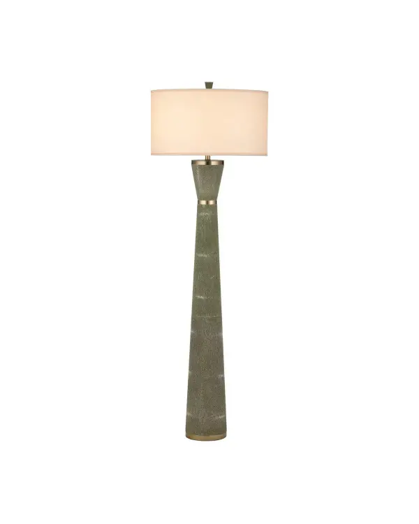 The Galuchat floor lamp brings textural sophistication with its green faux shagreen finish and brass accents. The belted hourglass silhouette and drum shade create an elegant statement piece for refined interiors.