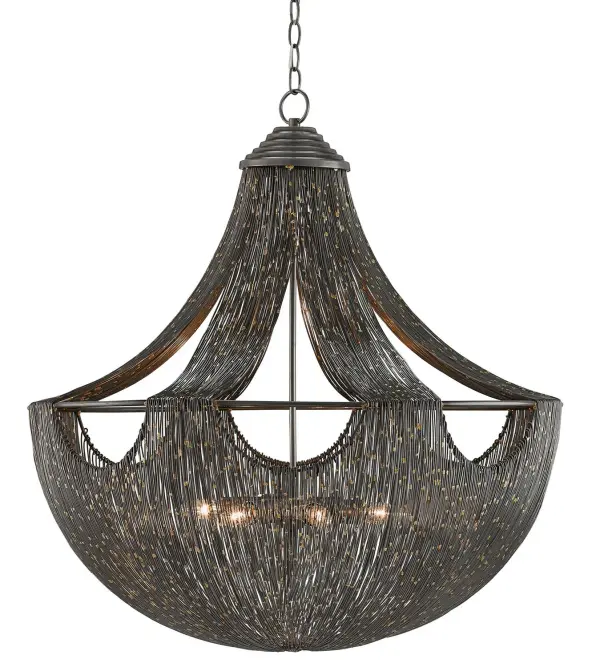 The Eduardo chandelier stands out with its hand-wrapped iron wire construction creating a sophisticated scalloped pattern. The natural iron finish catches light beautifully, creating golden highlights that add warmth and visual interest to any space.