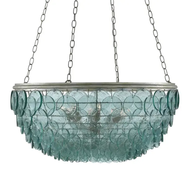 The Quorum chandelier transforms recycled glass into art with overlapping discs that create a mottled mosaic light effect. The silver leaf wrought iron frame provides elegant contrast to the turquoise-tinted glass, making this a statement piece for transitional and coastal interiors.